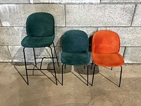 Partij gestoffeerde barkrukken en stoelen