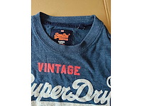 Partij kleding (1300x) - afbeelding 49 van  61
