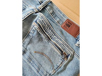 Partij kleding (1300x) - afbeelding 52 van  61