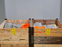 Partij kunststof overalls