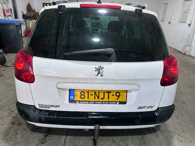 Peugeot - 207 sw - 1.4 vti xs - 81-njt-9- 2009 - afbeelding 12 van  18