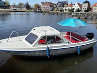 Polyester kajuitboot, kmv, met mercury f 15 el buitenboordmotor op pega boottrailer - afbeelding 15 van  31