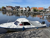 Polyester kajuitboot, kmv, met mercury f 15 el buitenboordmotor op pega boottrailer - afbeelding 28 van  31