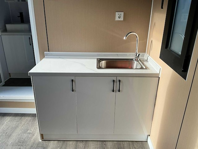 Portable home met 2 woonruimtes / 40 ft high cube - 12 meter containerwoning - afbeelding 2 van  28