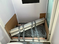 Portable home met 2 woonruimtes / 40 ft high cube - 12 meter containerwoning - afbeelding 9 van  28