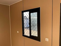 Portable home met 2 woonruimtes / 40 ft high cube - 12 meter containerwoning - afbeelding 19 van  28