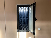 Portable home met 2 woonruimtes / 40 ft high cube - 12 meter containerwoning - afbeelding 27 van  28