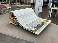 Presentatie meubel voor vloerkleden