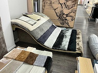 Presentatie meubel voor vloerkleden