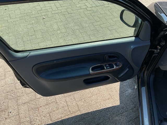 Renault clio 1.4-16v rxe 35-gr-tp - afbeelding 19 van  23