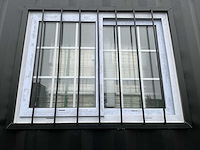 Rhino-cross-containers 12ft mini container met deur en raam - afbeelding 6 van  14