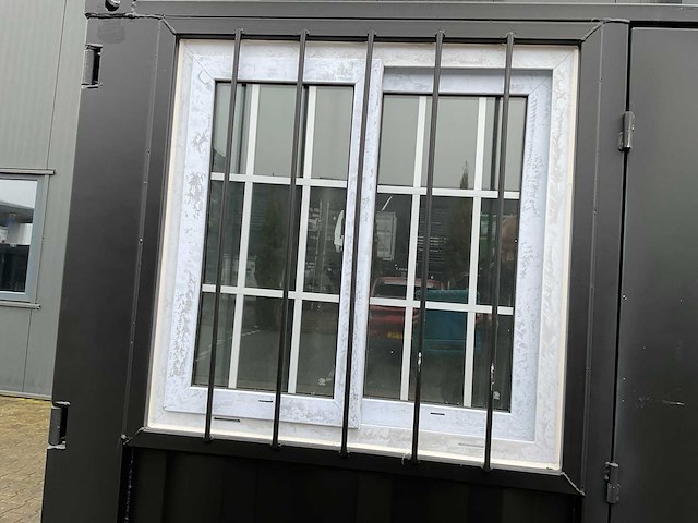 Rhino-cross-containers 7ft mini container met deur en raam - afbeelding 2 van  6