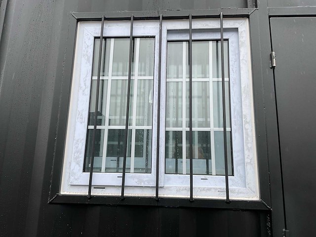 Rhino-cross-containers 9ft mini container met deur en raam - afbeelding 2 van  18