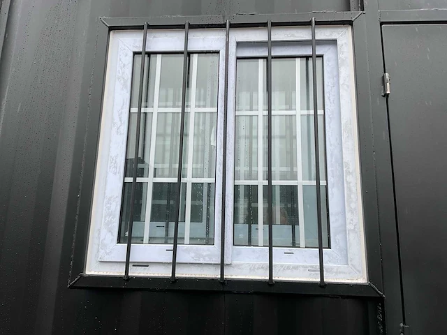 Rhino-cross-containers 9ft mini container met deur en raam - afbeelding 2 van  21