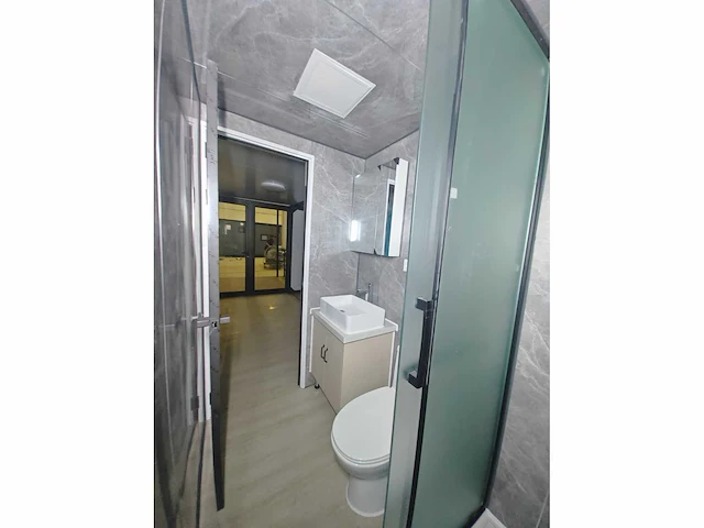 Rhino houses 20ft balcony zwart tiny house - afbeelding 13 van  22