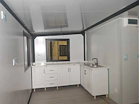 Rhino houses 20ft balcony zwart tiny house - afbeelding 16 van  22