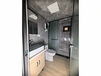 Rhino houses 40ft zwart tiny house - afbeelding 5 van  26