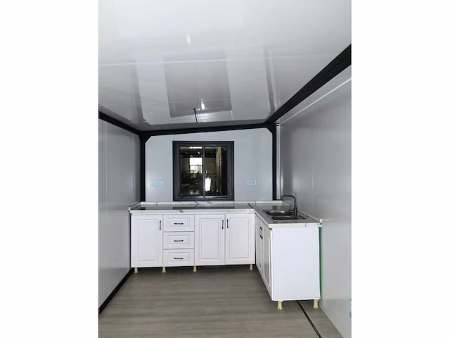 Rhino houses 40ft zwart tiny house - afbeelding 8 van  26