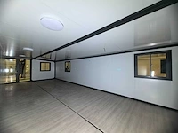 Rhino houses 40ft zwart tiny house - afbeelding 11 van  26