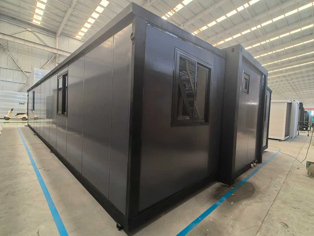 Rhino houses 40ft zwart tiny house - afbeelding 22 van  26