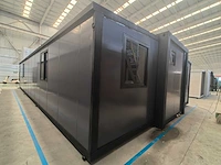 Rhino houses 40ft zwart tiny house - afbeelding 22 van  26