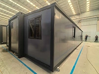 Rhino houses 40ft zwart tiny house - afbeelding 23 van  26