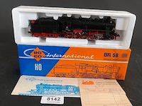 Roco goederentrein-stoomlocomotief met tender (baureihe 58) van de deutsche bundesbahn (db)