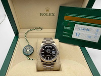 Rolex day date 228239 | 12-2019 | black diamond baguettes dial | white gold - afbeelding 9 van  12