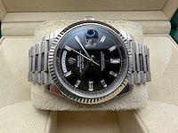 Rolex day date 228239 | 12-2019 | black diamond baguettes dial | white gold - afbeelding 7 van  12
