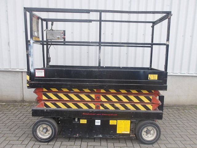 Schaarhoogwerker skyjack sj3220 8.09m elektrisch 1991 - afbeelding 1 van  1
