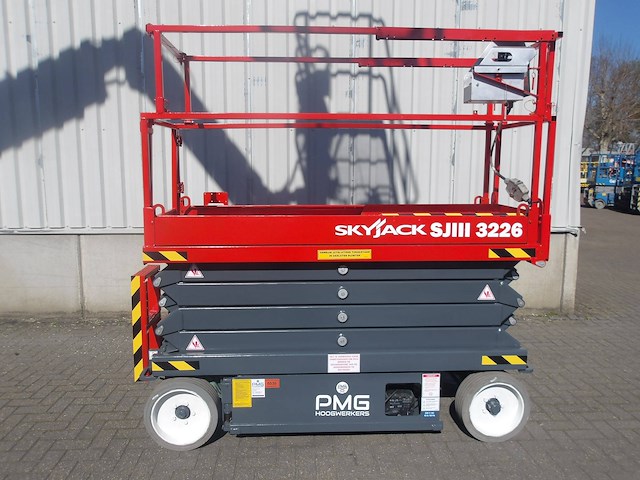 Schaarhoogwerker skyjack sj3226 9.92m elektrisch 2017 - afbeelding 1 van  1