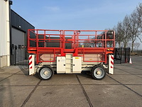 Schaarlift genie gs3390 diesel 12m 2010 - afbeelding 1 van  1