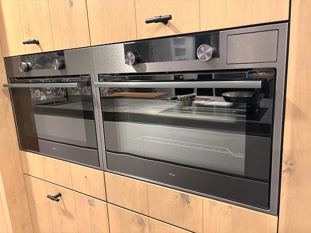 Schmidt + rotpunkt - showroomkeuken met atag apparatuur - afbeelding 11 van  24