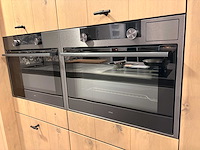 Schmidt + rotpunkt - showroomkeuken met atag apparatuur - afbeelding 11 van  24