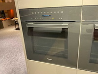 Schüller gala eiland showroomkeuken met kastenwand en coffeecorner - afbeelding 29 van  42