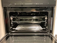 Schüller uma hoekopgestelde showroomkeuken - afbeelding 14 van  25