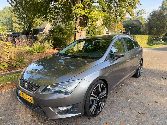 Seat - leon st - 1.4 tsi fr business - 2014 - 7-tkx-58 - afbeelding 1 van  14