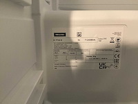 Showroom cucinesse italiaans evolve zandbeige lak en houtlook hoge kasten - afbeelding 31 van  31