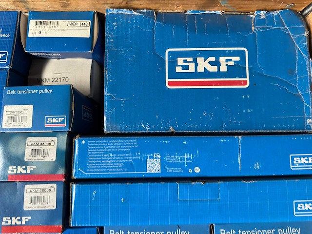 Skf, ina, nsk, koyo - partij skf automotive onderdelen: spanrollen, vrijloopdynamo-poelies, distributiesets, krukasdempers en waterpompen - afbeelding 5 van  11