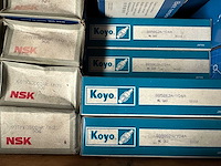 Skf, ina, nsk, koyo - partij skf automotive onderdelen: spanrollen, vrijloopdynamo-poelies, distributiesets, krukasdempers en waterpompen - afbeelding 9 van  11