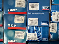 Skf, ina, nsk, koyo - partij skf automotive onderdelen: spanrollen, vrijloopdynamo-poelies, distributiesets, krukasdempers en waterpompen - afbeelding 11 van  11