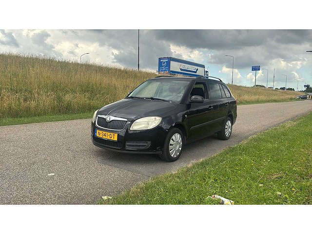 Skoda fabia combi 1.2-12v go 2010 | n-341-dt i - afbeelding 1 van  13