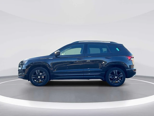 Skoda karoq 1.5 tsi sportline business | g-861-gv - afbeelding 2 van  38