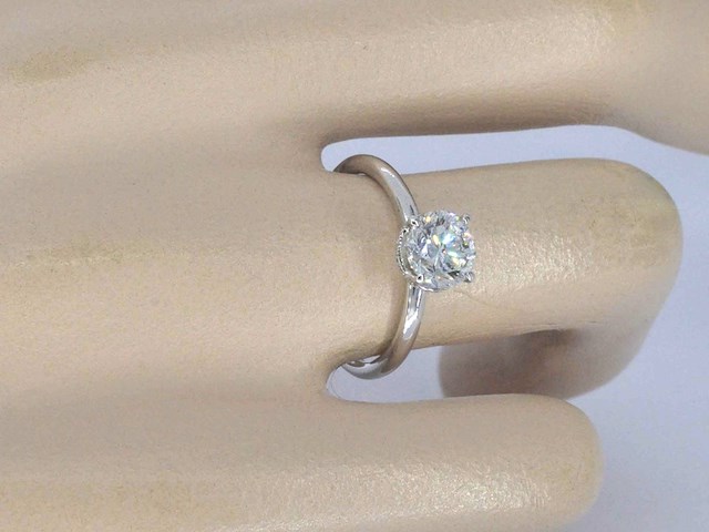 Solitaire ring met een natuurlijke briljant geslepen diamant van 1.20 carat en hidden halo - afbeelding 5 van  12