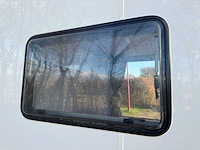 Stahlworks - eco 6000 a wit - tiny house / atelier / kantoor badkamer in midden en bed rechts - afbeelding 28 van  35