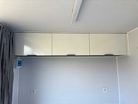 Stahlworks - eco 6000 a wit - tiny house / atelier / kantoor badkamer in midden en bed rechts - afbeelding 16 van  37