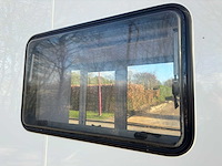 Stahlworks - eco 6000 a wit - tiny house / atelier / kantoor badkamer in midden en bed rechts - afbeelding 23 van  37