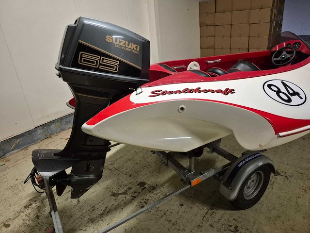 Stealthcraft - + 65 pk suzuki - race - speedboot met freewheel trailer - afbeelding 20 van  24
