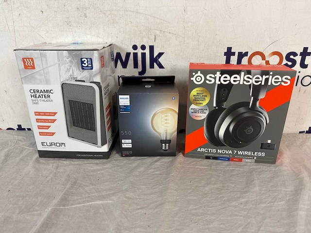 Steelseries arctis nova 7 - draadloze gaming headset - zwart + eurom keramische kachel safe-t-heater 2400 + philips hue filament globelamp g94 - afbeelding 1 van  4
