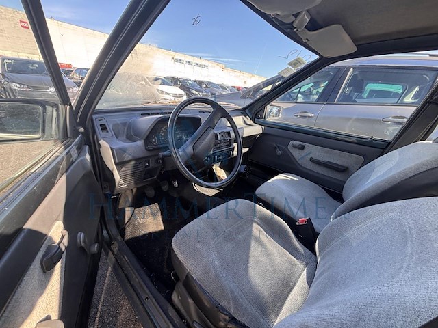 Subaru justy 1.3i 16v g3x airco awd, 1992 - afbeelding 13 van  15